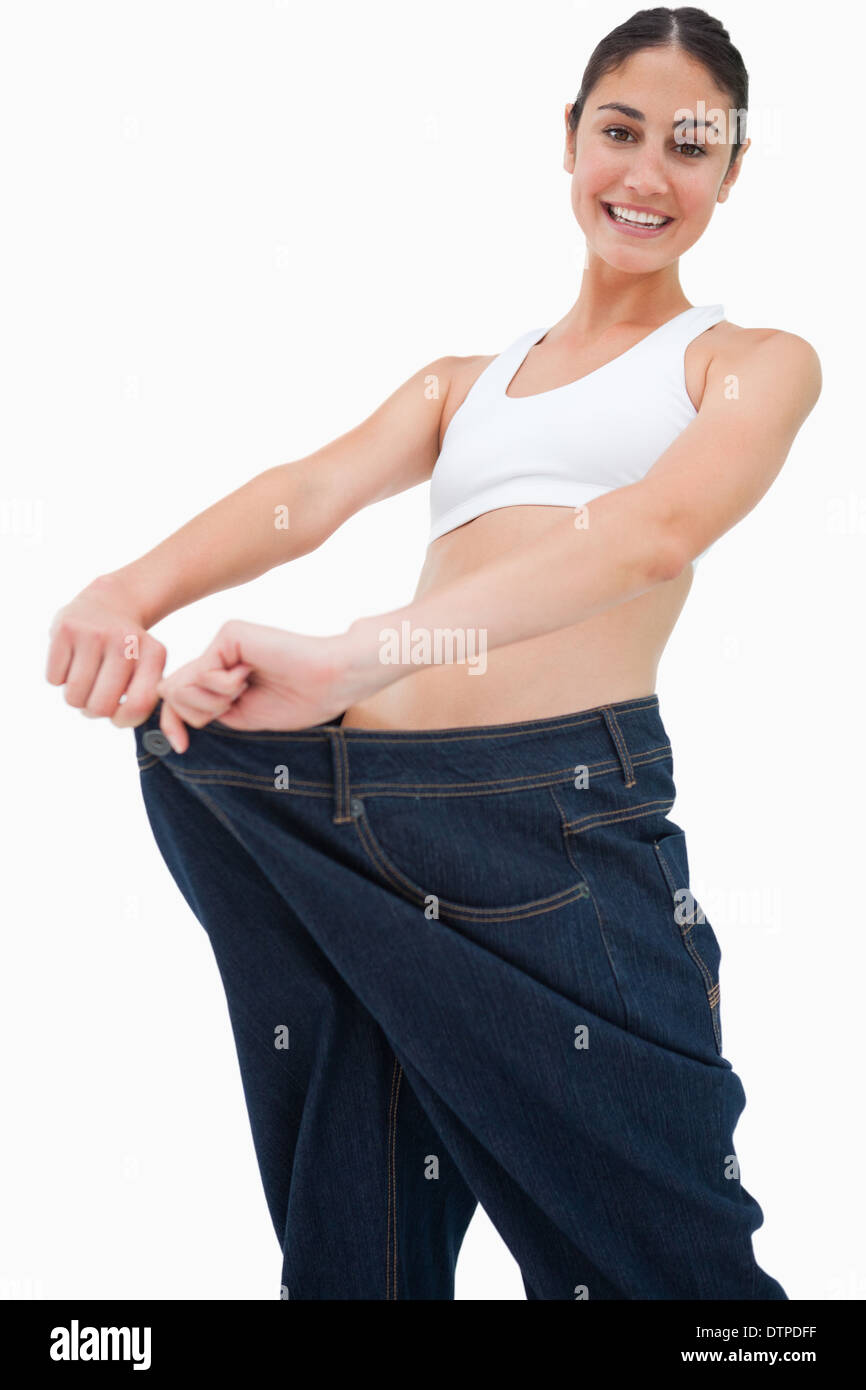 in a jeans too big Stock Photo Alamy