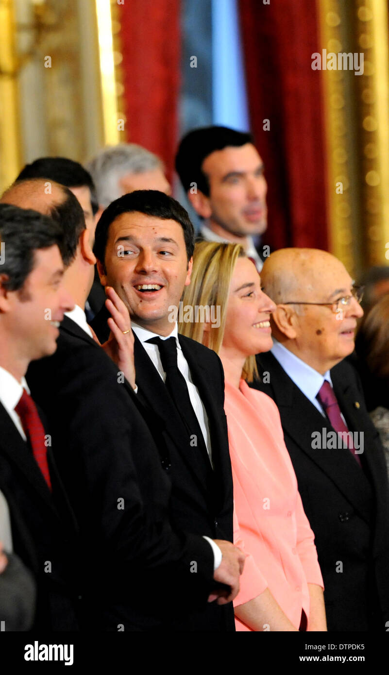 Rome, Italy. 22nd Feb, 2014. Italy'new primier Matteo Renzi (C) talks with members of his cabinet after the swearing-in ceremony in Quirinale palace in Rome on February 22, 2014. Italy's new Prime Minister Matteo Renzi and his cabinet ministers were sworn in on Saturday before Italian President Giorgio Napolitano, starting their task to accelerate reforms and revive the troubled economy. Credit:  Xu Nizhi/Xinhua/Alamy Live News Stock Photo