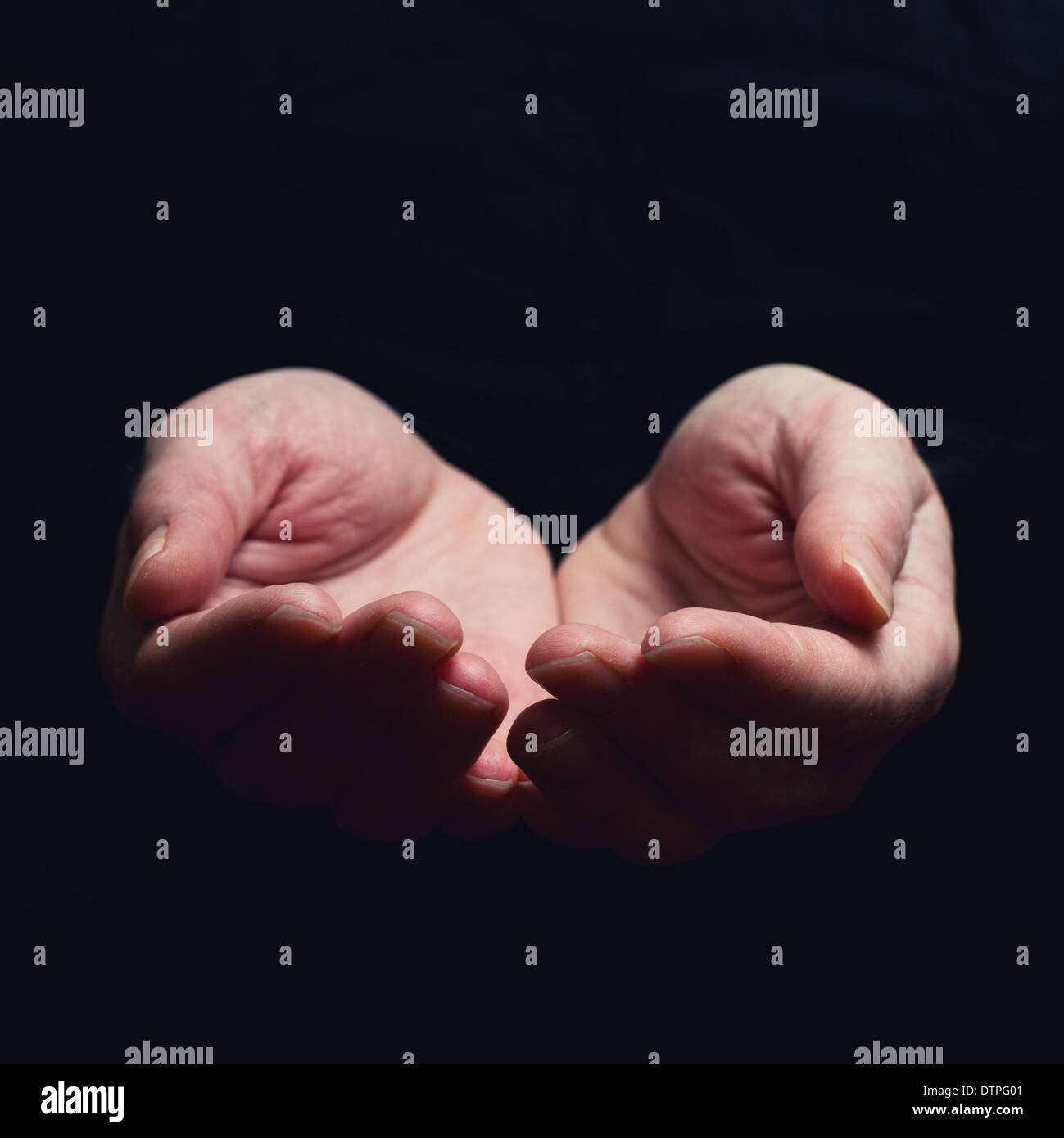 Open hands. Holding, giving, showing concept. Selective focus on fingers. Stock Photo