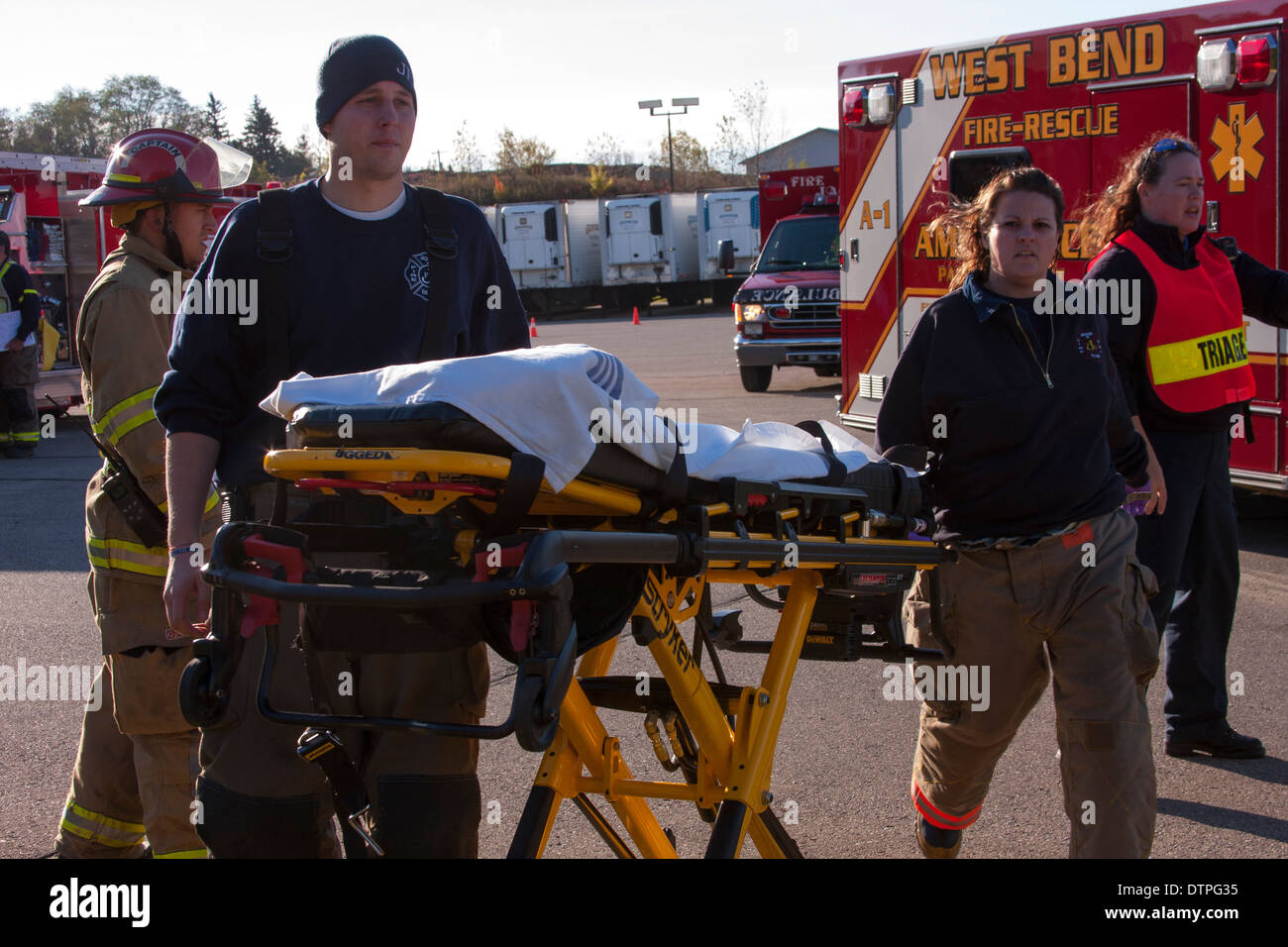 Emts arriving at scene of a mass casualty incident Stock Photo