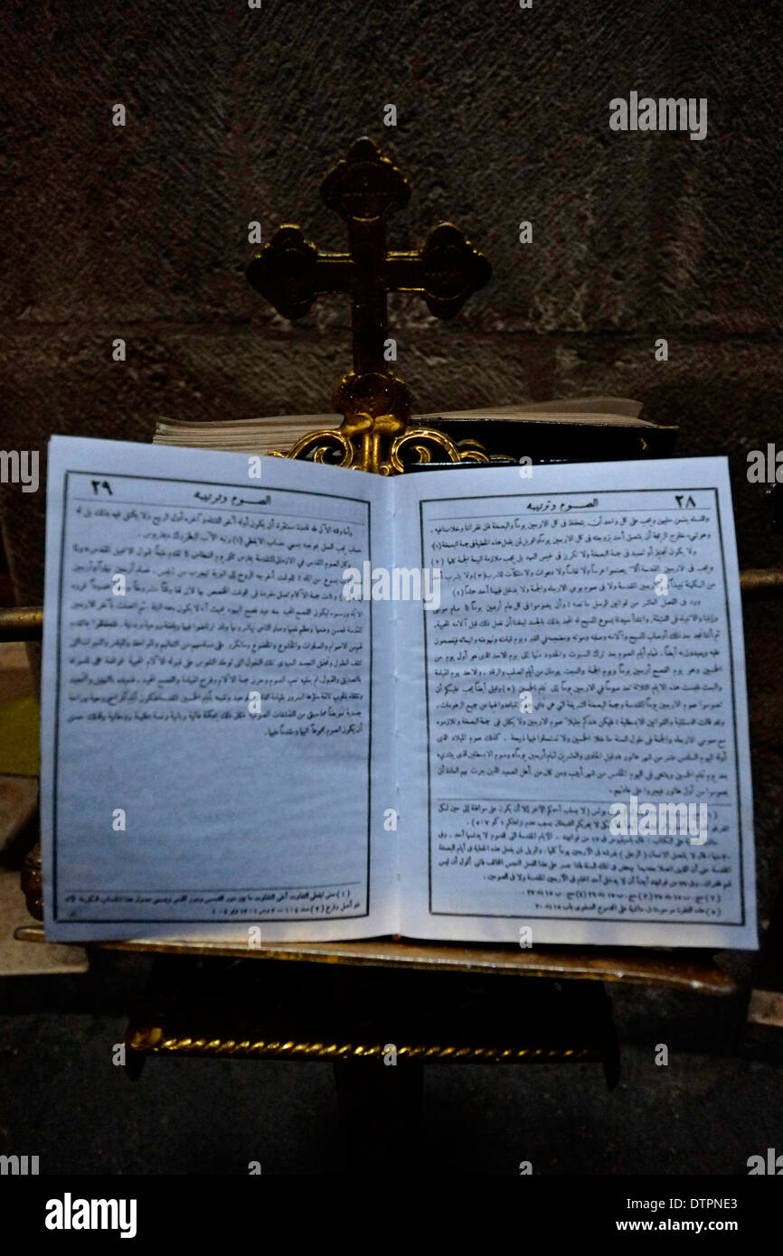 A Christian prayer book in Arabic in Holy Sepulchre church in old city East Jerusalem Israel Stock Photo