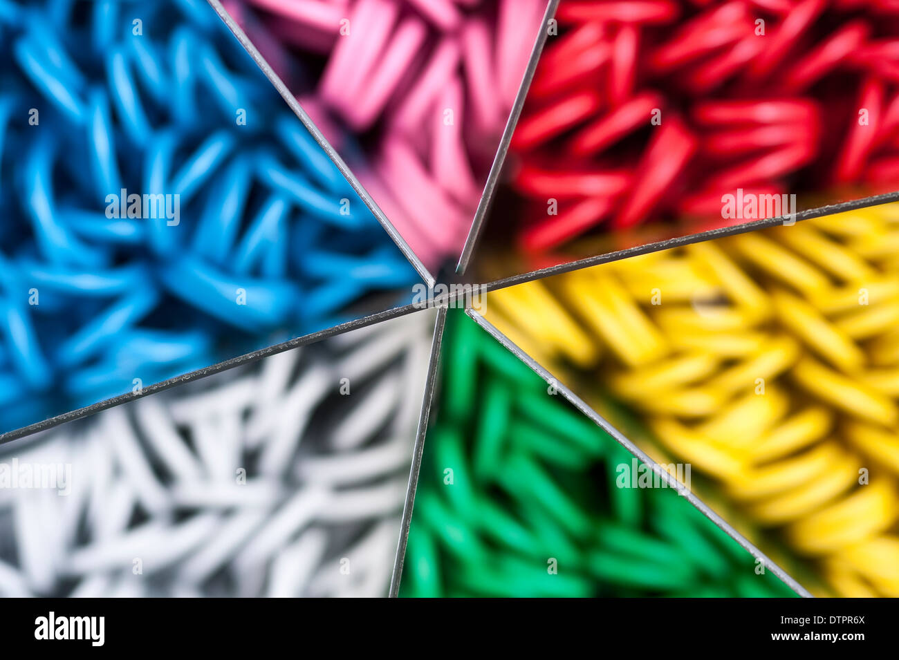 Container of multicolored paper clips Stock Photo
