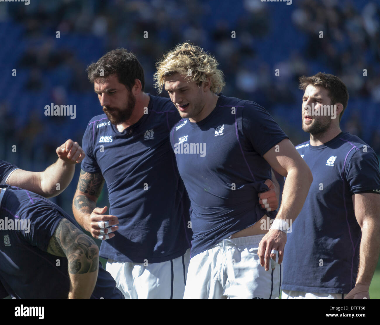 Rome, Italy. 22nd Feb, 2014. 6 Nations rugby Italy vs Scotland. Scotland beat Italy by 21 points to 20 with a Duncan Weir drop kick a minute before full time. Jim Hamilton, Richie Gray and Ryan Wilson exercising in the scrum before kick-off. Credit:  Stephen Bisgrove/Alamy Live News Stock Photo