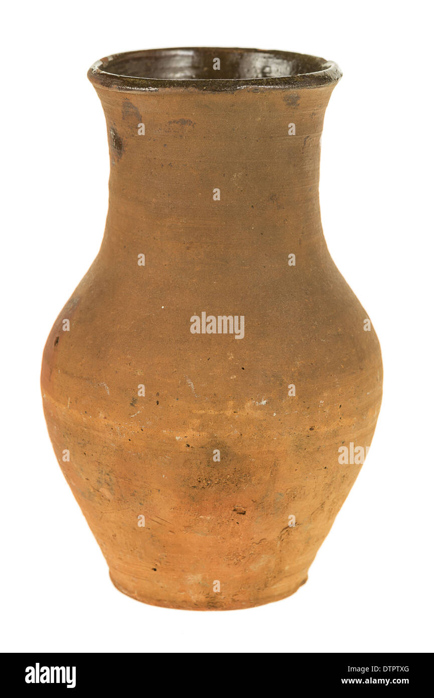 Old clay jug for milk isolated on white background Stock Photo