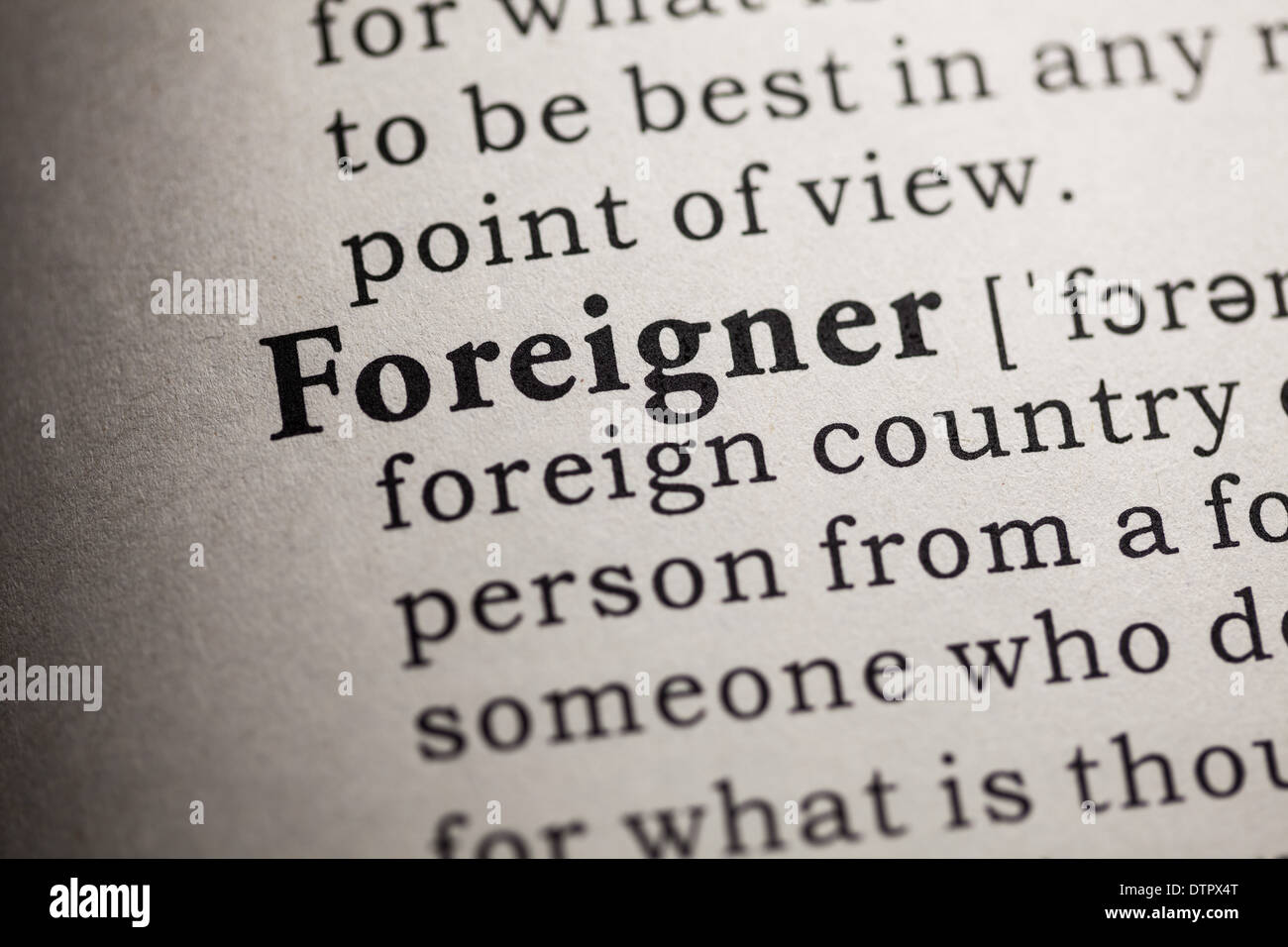 Fake Dictionary, Dictionary definition of the word foreigner. Stock Photo
