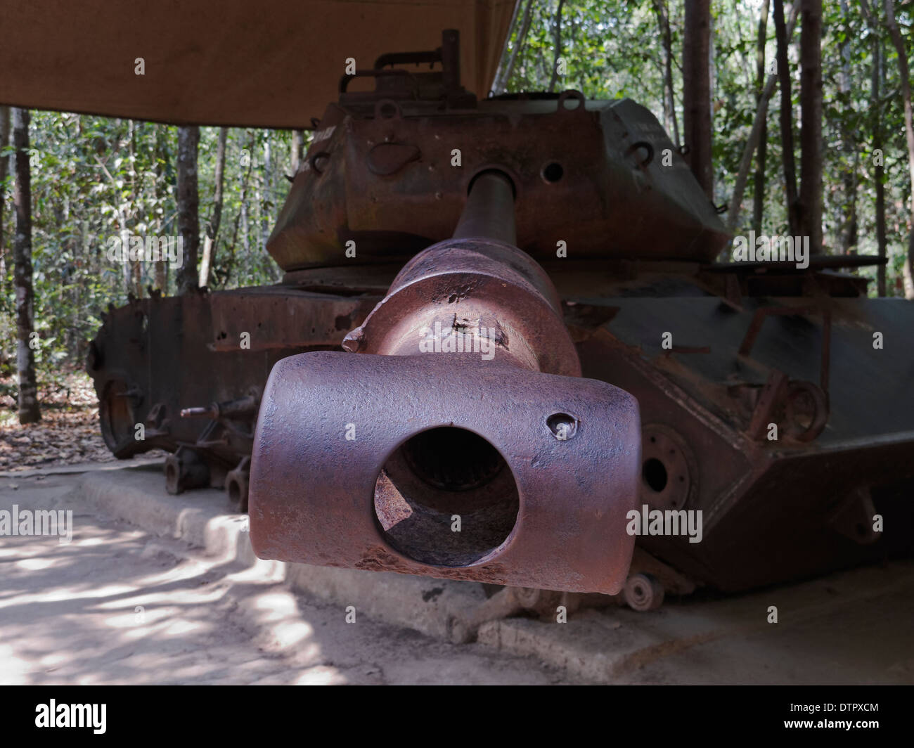 An ex- US Army M41 'Walker Bulldog' light tank destroyed by a delay mine in 1970. Cu Chi Tunnels, Saigon, Vietnam. Stock Photo