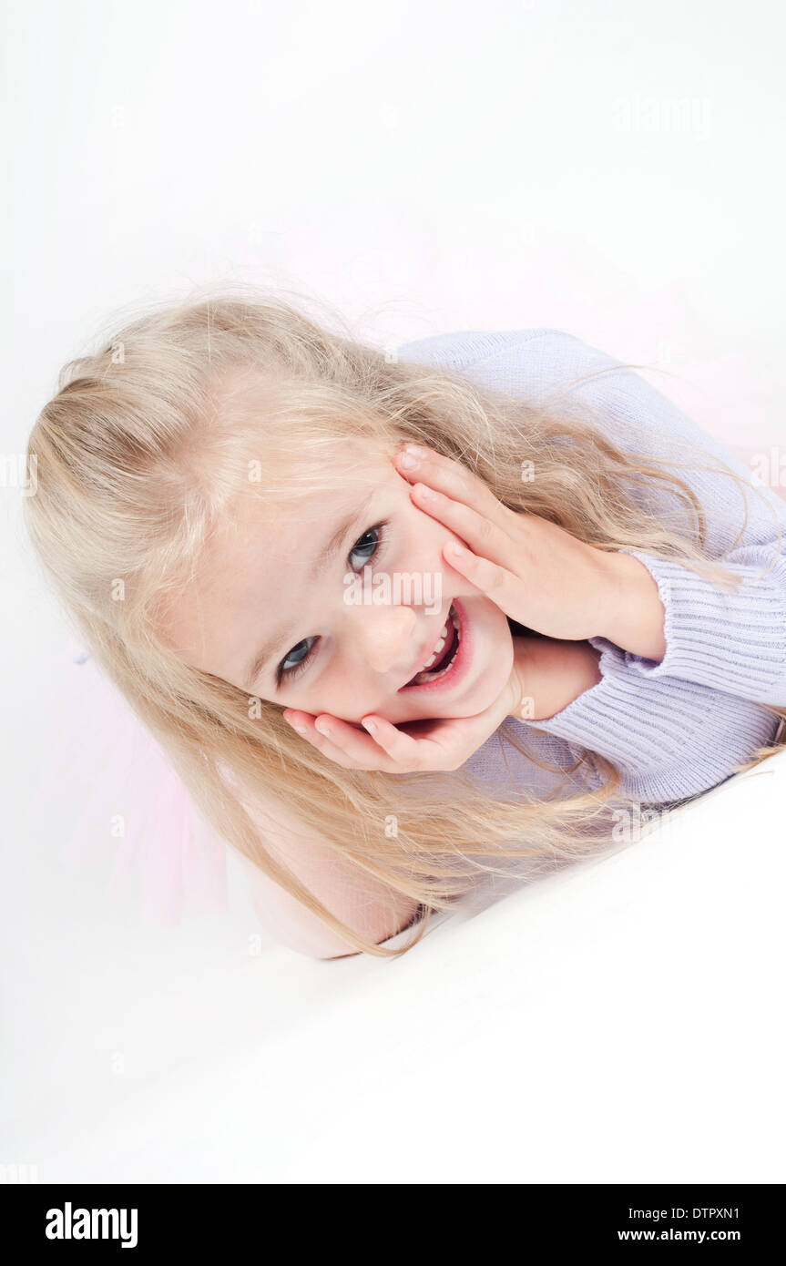 Portrait of happy blond little girl Stock Photo - Alamy