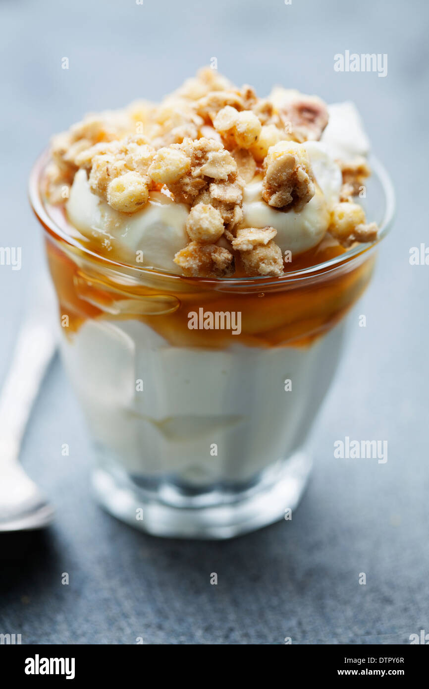 greek yogurt with honey and granola Stock Photo