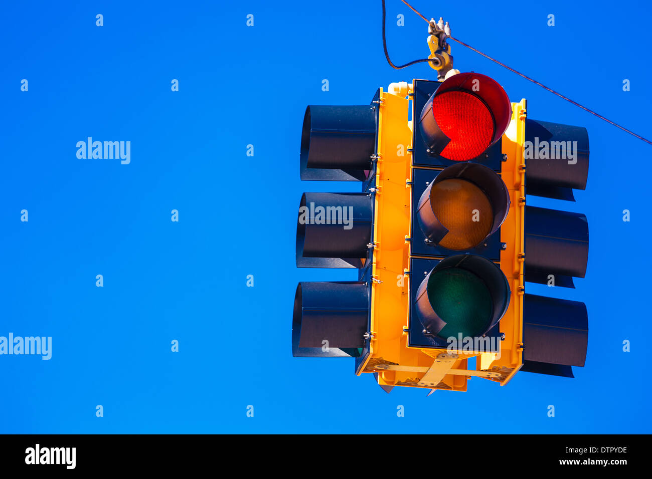 A red traffic signal with a sky blue background Stock Photo - Alamy