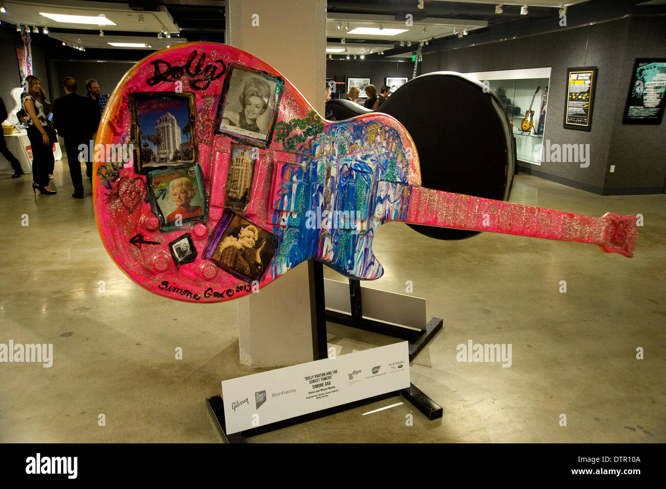 Hollywood, USA. 21st Feb, 2014. Gibson art guitar project contributor Simone Gad's creation of a guitar inspired by Dolly Parton.The art guitars were displayed on the Sunset Strip for a year and then auctioned off at Bonham's with the proceeds going to charity. Credit:  Robert Landau/Alamy Live News Stock Photo