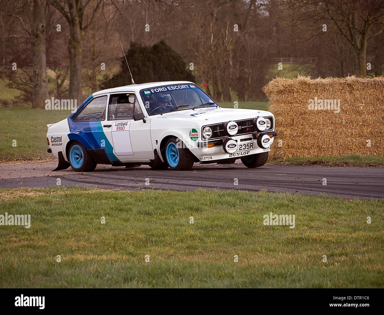 Stoneleigh Park, Warwickshire, UK. 22nd Feb, 2014. 1970 Ford Escort MII classic rally car cornering at speed on the rally test stage at Race Retro exhbition Stoneleigh Park Warwickshire UK 22/2/2014 Credit:  Martyn Goddard/Alamy Live News Stock Photo
