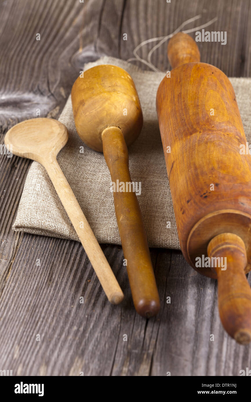 Baking utensils lying on the jute fabric with copy space in the upper