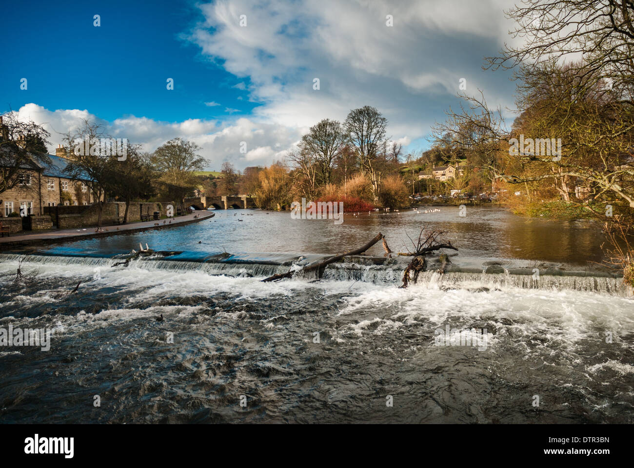 Rough, fast flowing high water on the river Wye, Bakewell after heavy rain and storms. Stock Photo