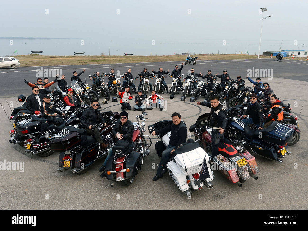 Wuhan, China's Hubei province. 22nd Feb, 2014. Fans of Harley-Davidson motorbikes participate in a weekend tour in Wuhan City, capital of central China's Hubei province, Feb. 22, 2014. © Zhou Chao/Xinhua/Alamy Live News Stock Photo