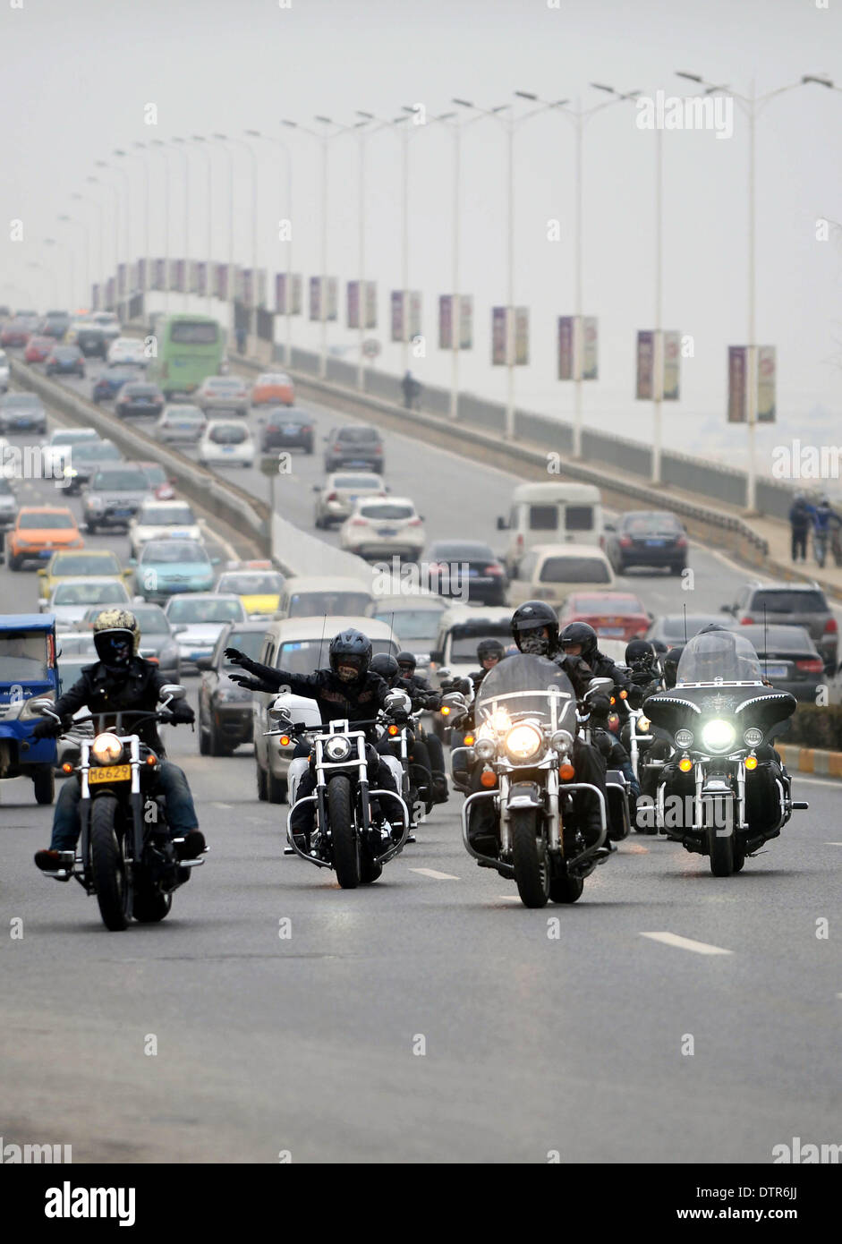 Wuhan, China's Hubei province. 22nd Feb, 2014. Fans of Harley-Davidson motorbikes participate in a weekend tour in Wuhan City, capital of central China's Hubei province, Feb. 22, 2014. © Zhou Chao/Xinhua/Alamy Live News Stock Photo