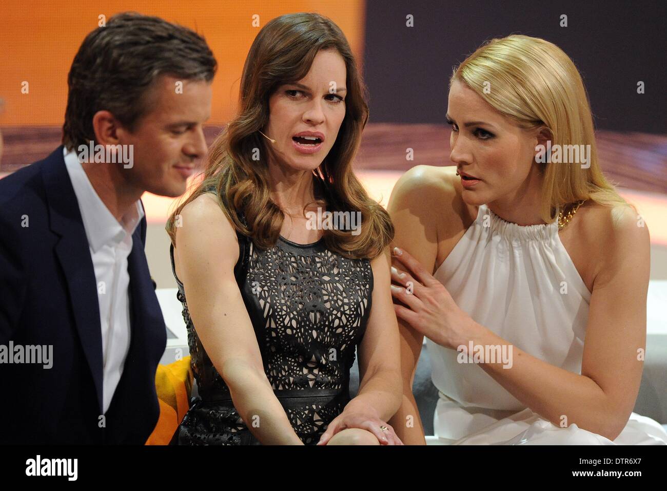 Duesseldorf, Germany. 22nd Feb, 2014. US actress Hilary Swank (C) and