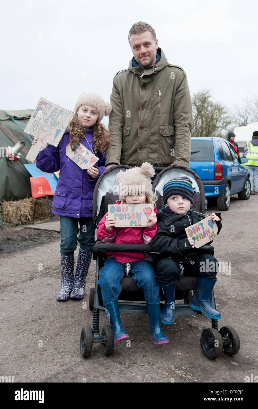Barton Moss, Salford, UK. Sunday 23rd February 2014. A family protest on Barton Moss near Manchester against exploratory drilling close to the IGas Barton site. Campaigners fear the process of hydraulic fracturing could be environmentally hazardous, and lead to the poisoning of water supplies and a contamination of the atmosphere. Credit:  Russell Hart/Alamy Live News. Stock Photo