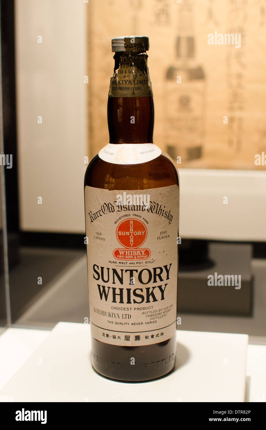 An old bottle of Suntory whisky on display in Whisky Museum in Yamazaki, near Kyoto, Japan. Stock Photo
