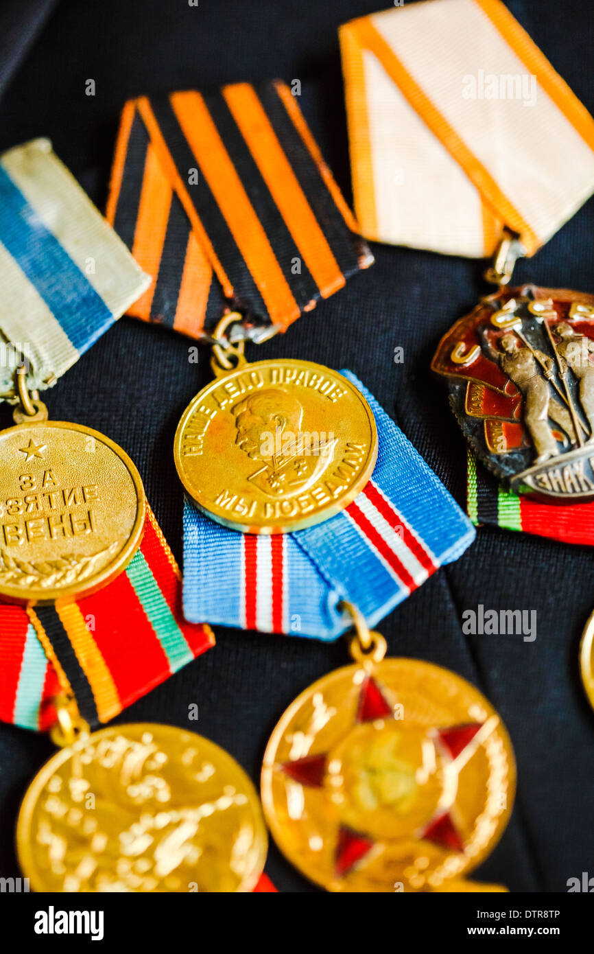Medals of a victory in the Great Patriotic War on the parade uniform of the veteran of the Soviet Union Armed Forces Stock Photo