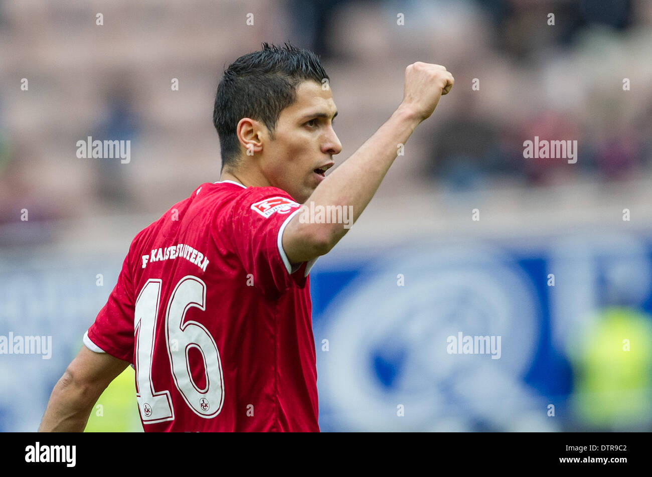 Kaiserslautern, Germany. 23rd Feb, 2014. Kaiserslautern's Karim Matmour celebrates his 1-2 goal during the second league match between FC Kaiserslautern and VfR Aalen at Fritz-Walter-Stadium in Kaiserslautern, Germany, 23 February 2014. Photo: Uwe Anspach (ATTENTION: Due to the accreditation guidelines, the DFL only permits the publication and utilisation of up to 15 pictures per match on the internet and in online media during the match.)/dpa/Alamy Live News Stock Photo