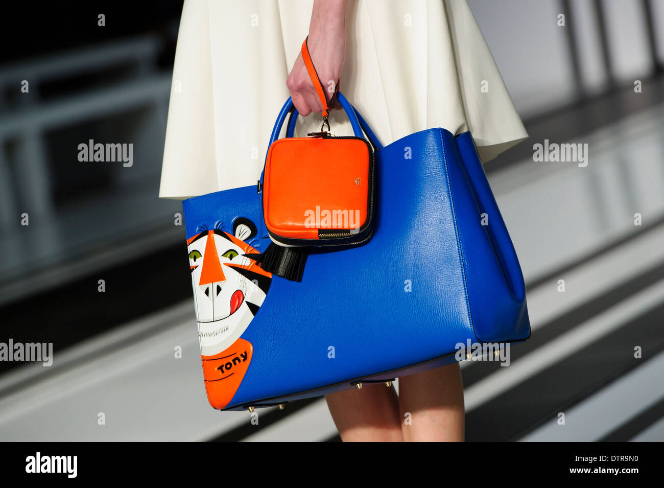 A model wears an accessory created by Anya Hindmarch during London Fashion Week Autumn/Winter 2014, in central London. Stock Photo