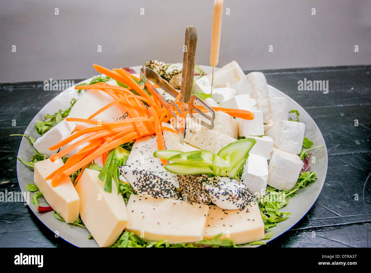 Cheese plater a plate of a selection of cheeses Stock Photo