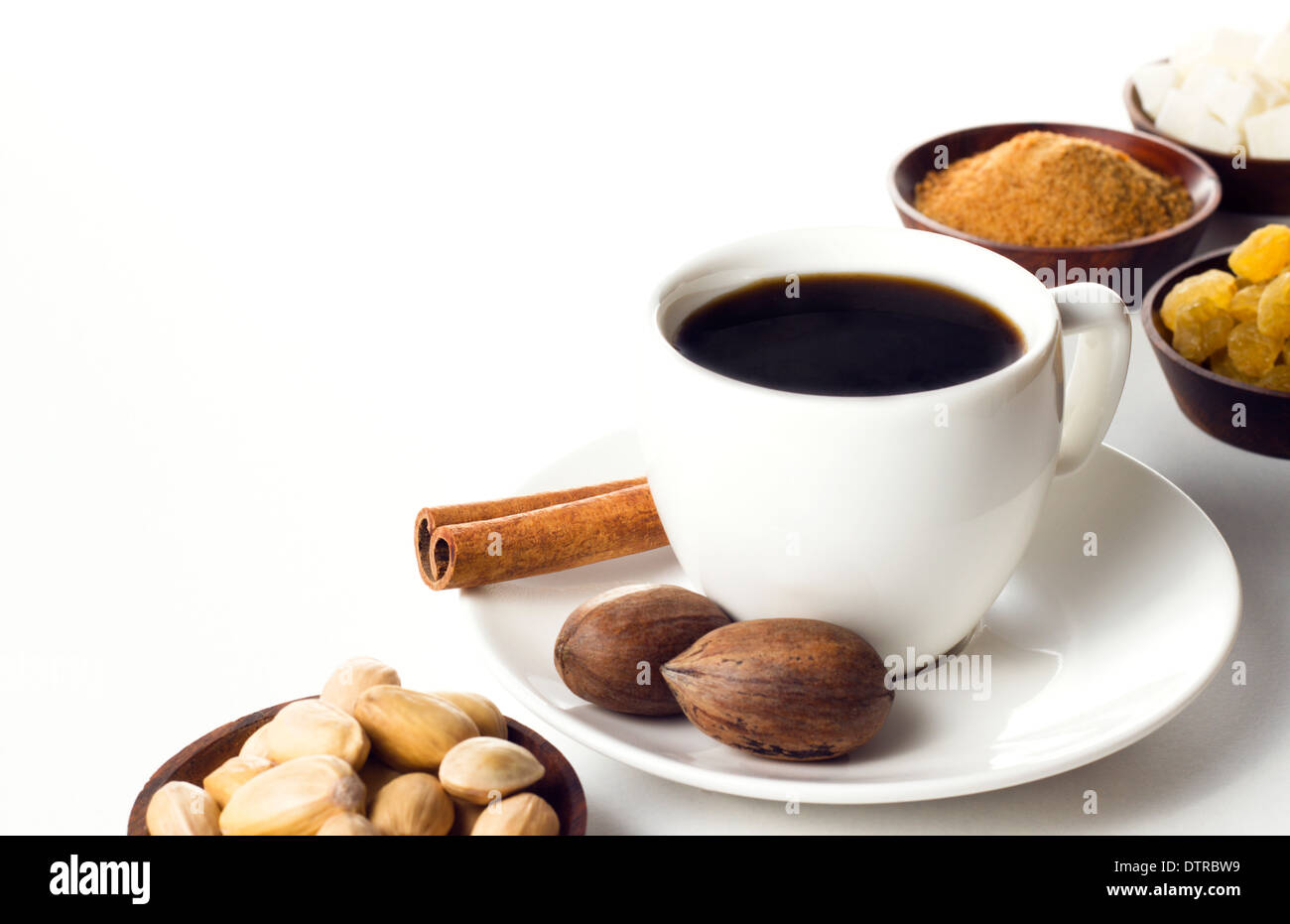 natural coffee with nuts and sugar on white table Stock Photo