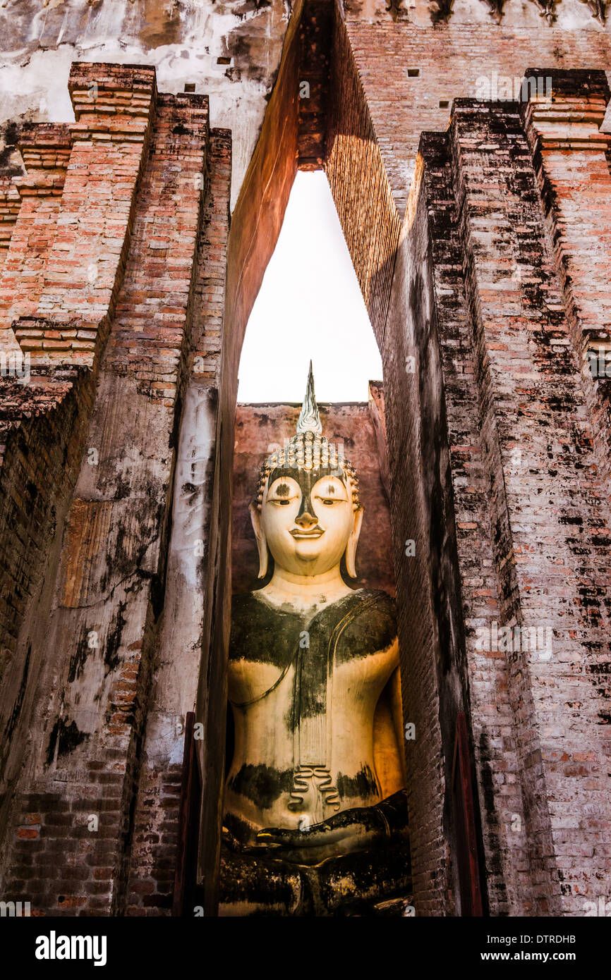 700 years ancient big buddha statue Sukhothai,Thailand. Named Talkable buddha statue, Wat Si Chum temple, Sukhothai, Thailand Stock Photo