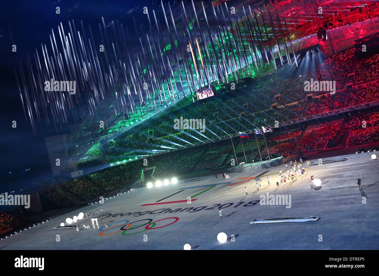 Sochi, Russia. 23rd February 2014. A general view as 'See You In PyeongChang' is projected after the handing over ceremony to the city of PyeongChang during the Closing Ceremony in Fisht Olympic Stadium at the Sochi 2014 Olympic Games, Sochi, Russia, 23 February 2014. PyeongChang is host of the 2018 Olympic Winter Games. Photo: Daniel Karmann/dpa/Alamy Live News Stock Photo