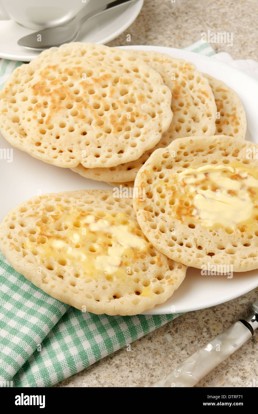 Hot buttered pikelets a regional variation of the traditional crumpet Stock Photo