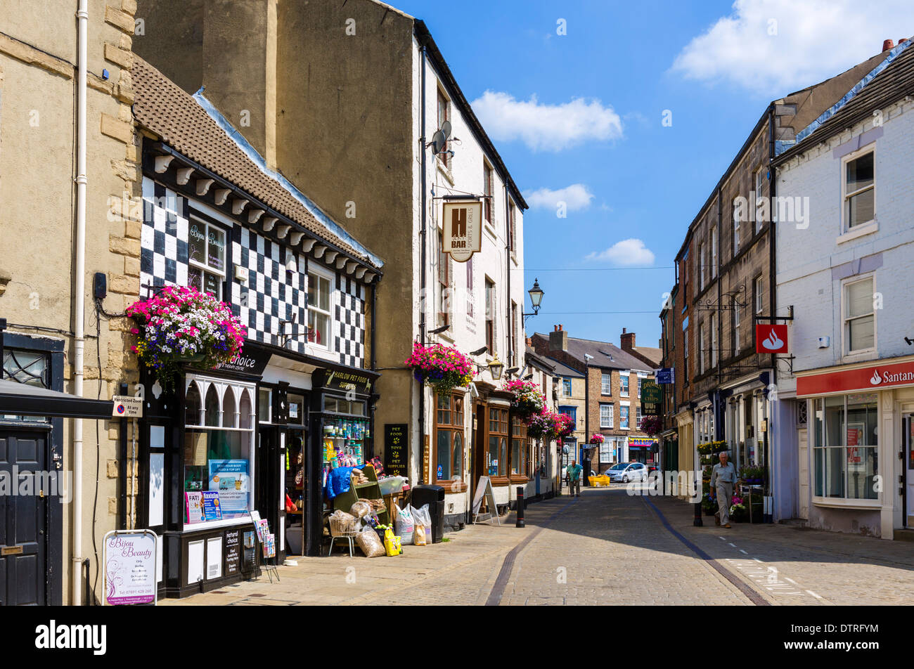 Shops on Silver Street in the historic town centre, Knaresborough, North Yorkshire, England, UK Stock Photo