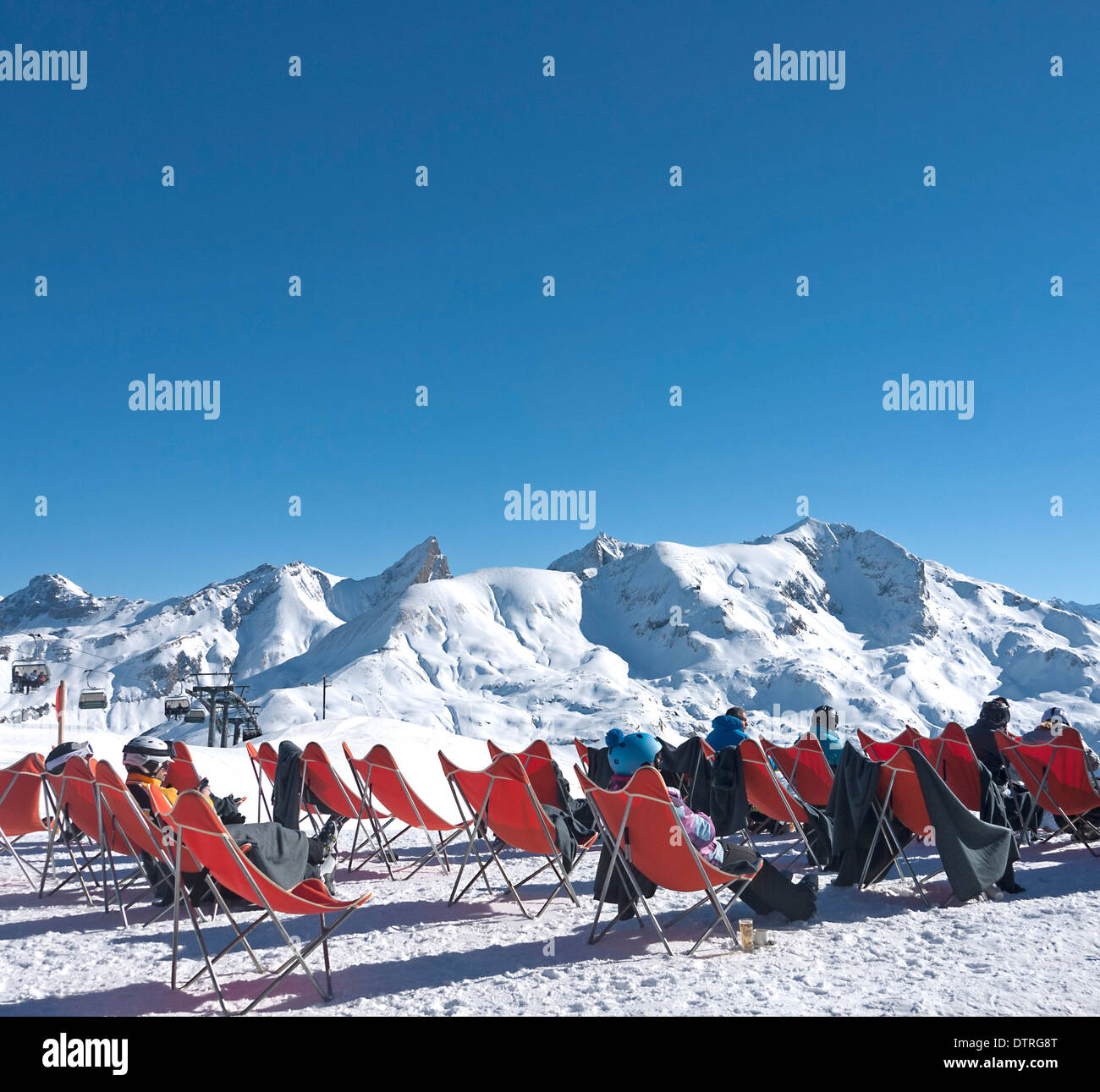 Deckchairs outside the restaurant at the top of the Zursersee chairlift above Zurs in Austria Stock Photo