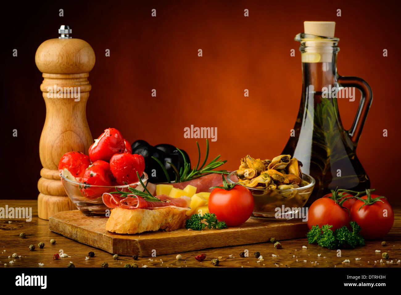 still life with traditional tapas party snacks and olive oil Stock Photo
