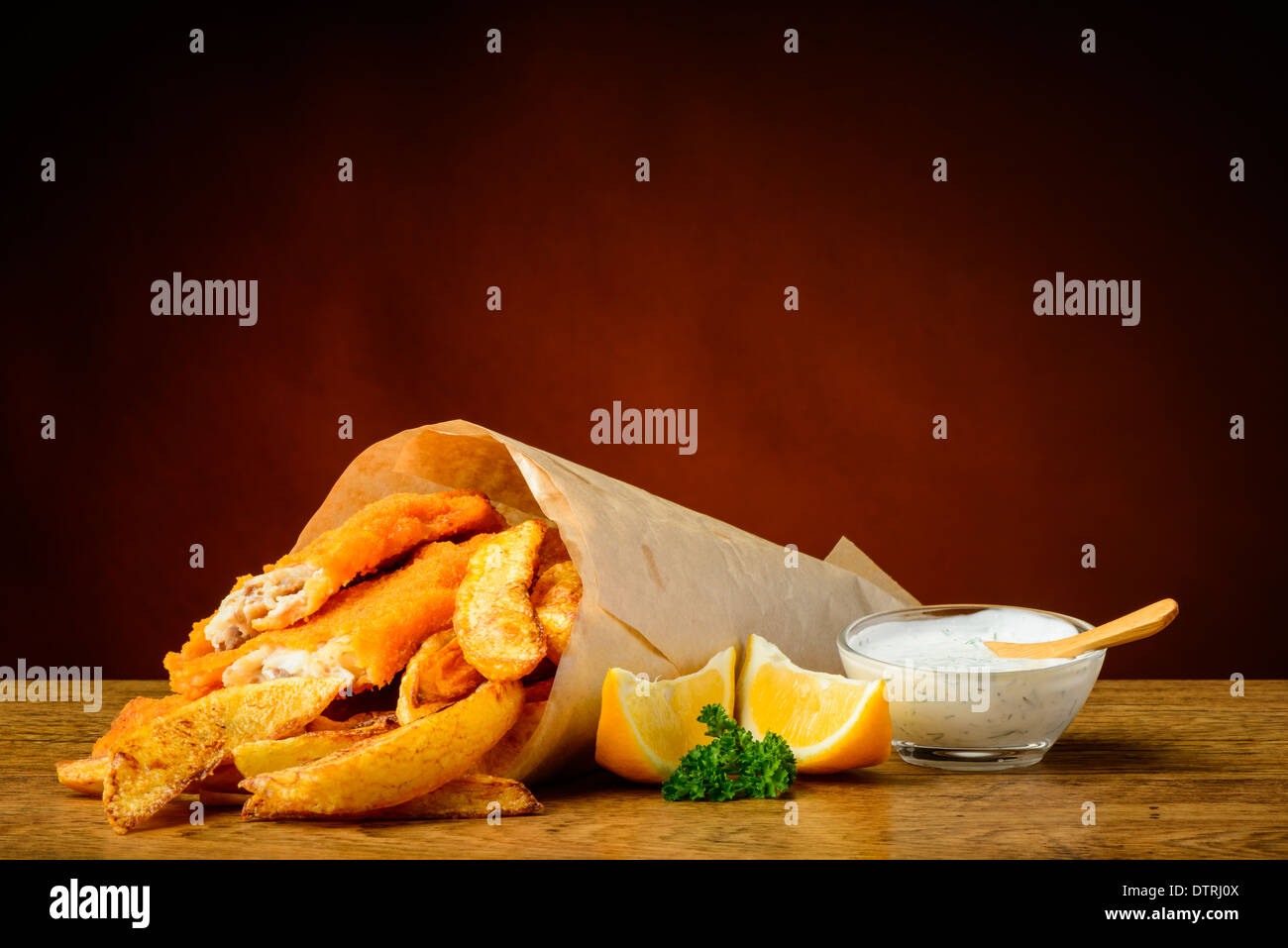 still life with traditional fish and chips menu, lemons and dip sauce