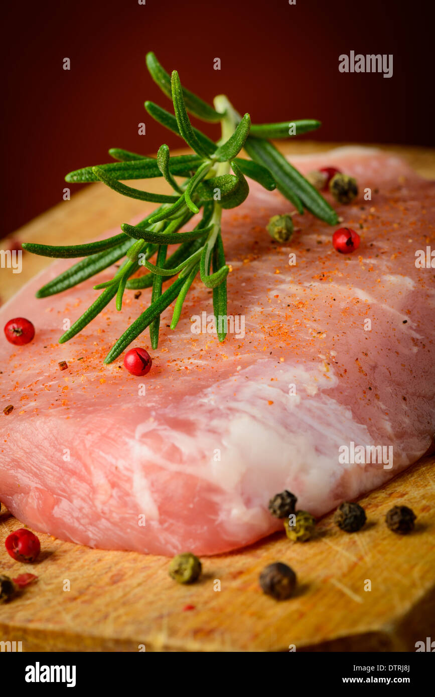 still life with raw pork steak closeup detail and spices Stock Photo