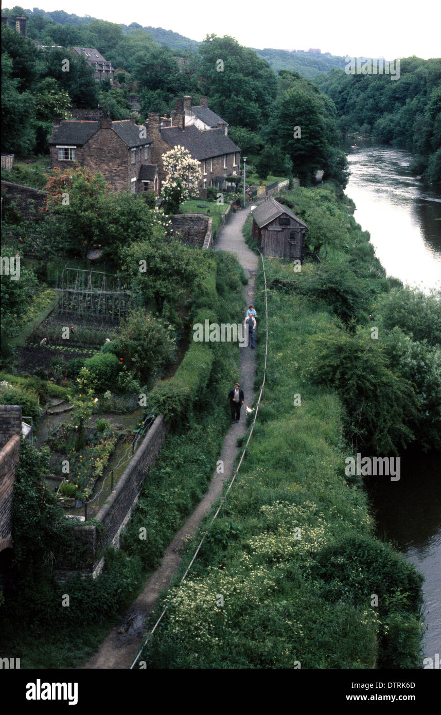 Riverside path and houses in Ironbridge Shropshire Uk 1981 Stock Photo