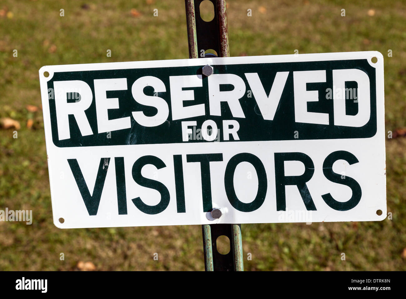 Reserved for visitors - sign seen by the landmark Stock Photo