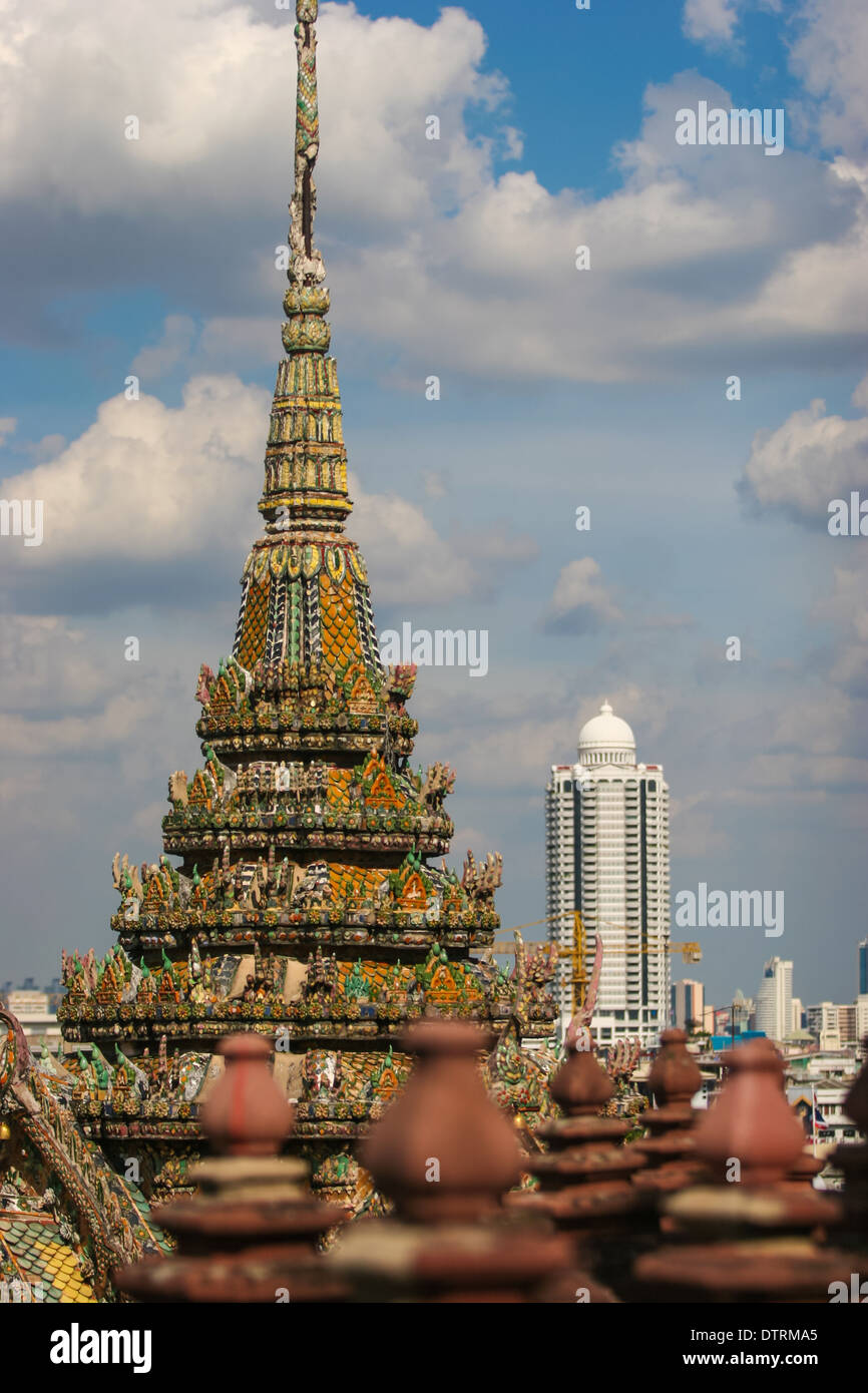 Traditional Temple and modern buildings in Bangkok, Thailand Stock Photo