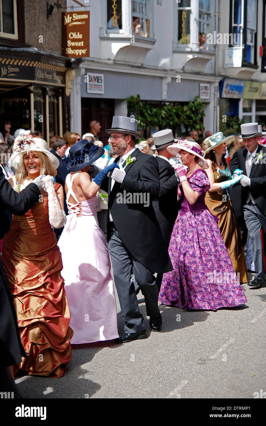 Dancers at the Midday Floral Dance during the annual Flora day celebrations in Helston, Cornwall, UK Stock Photo