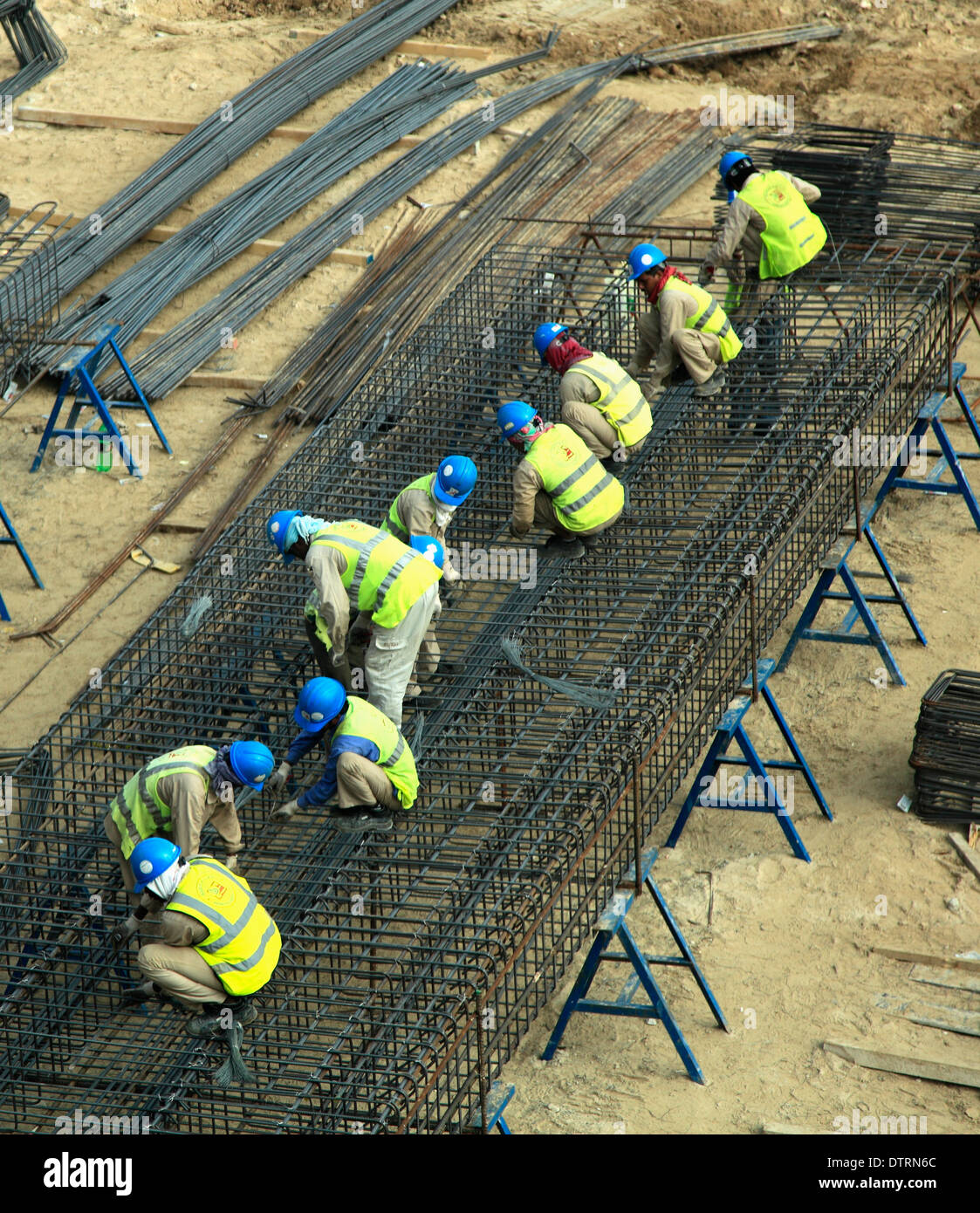 Construction site dubai workers hires stock photography and images Alamy