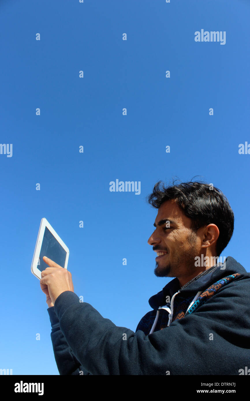 Young man witth tablet Stock Photo