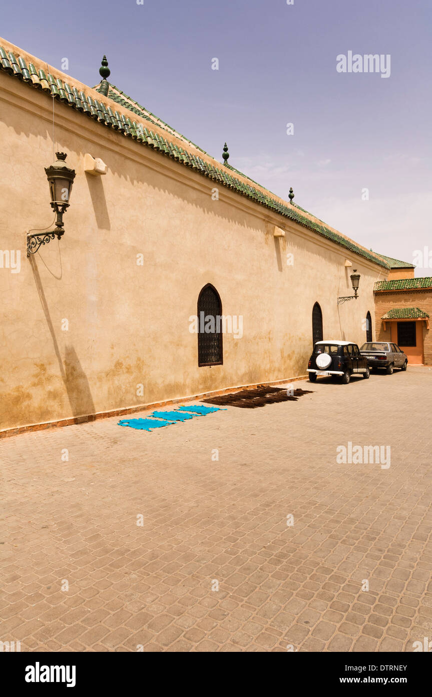 Dyed leather drying in the sun in Place de La Kissariat Ben Youssef in Marrakesh, Morocco. Stock Photo