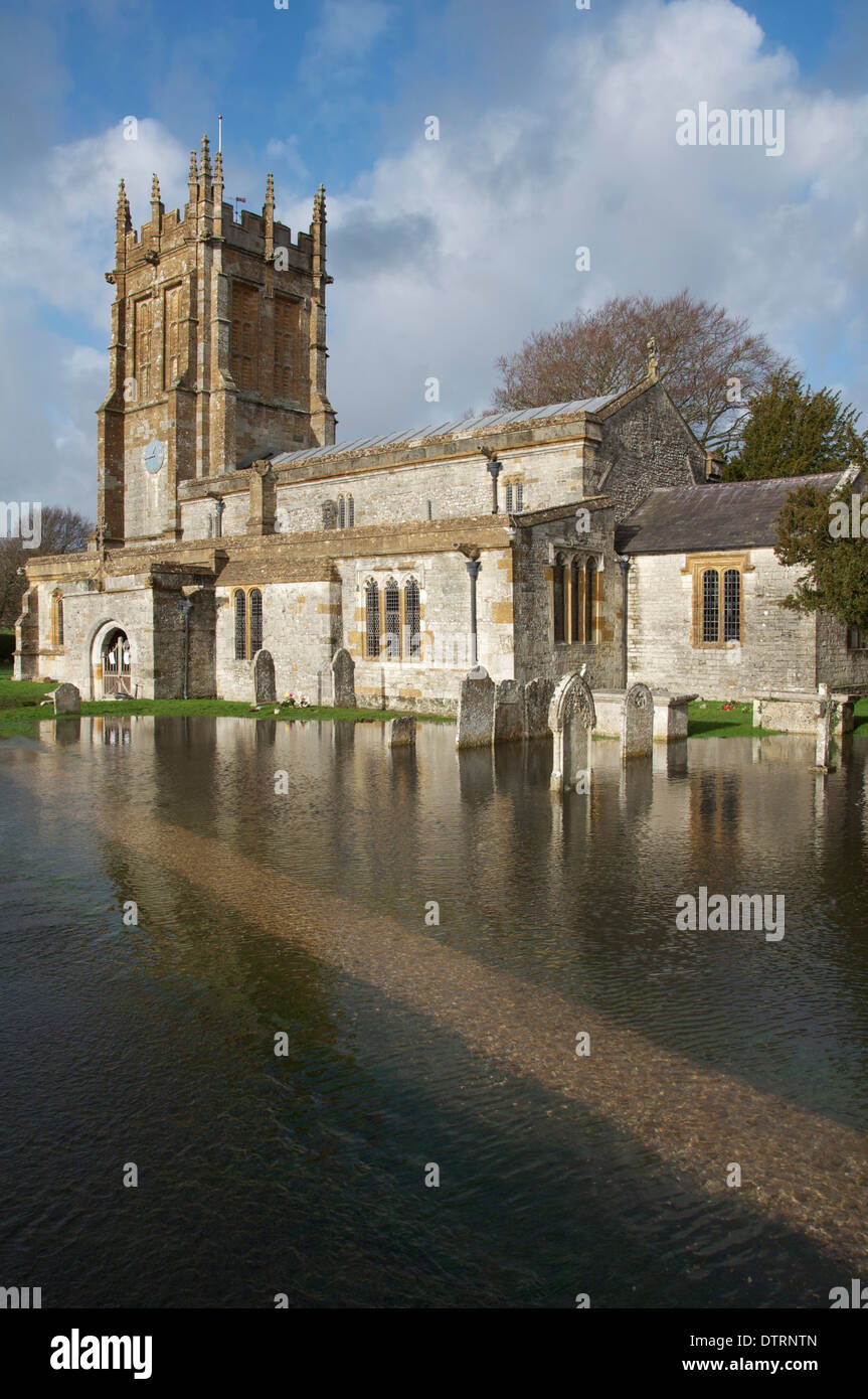 Flooding. The Church of St. Mary The Virgin, Charminster, flooded as