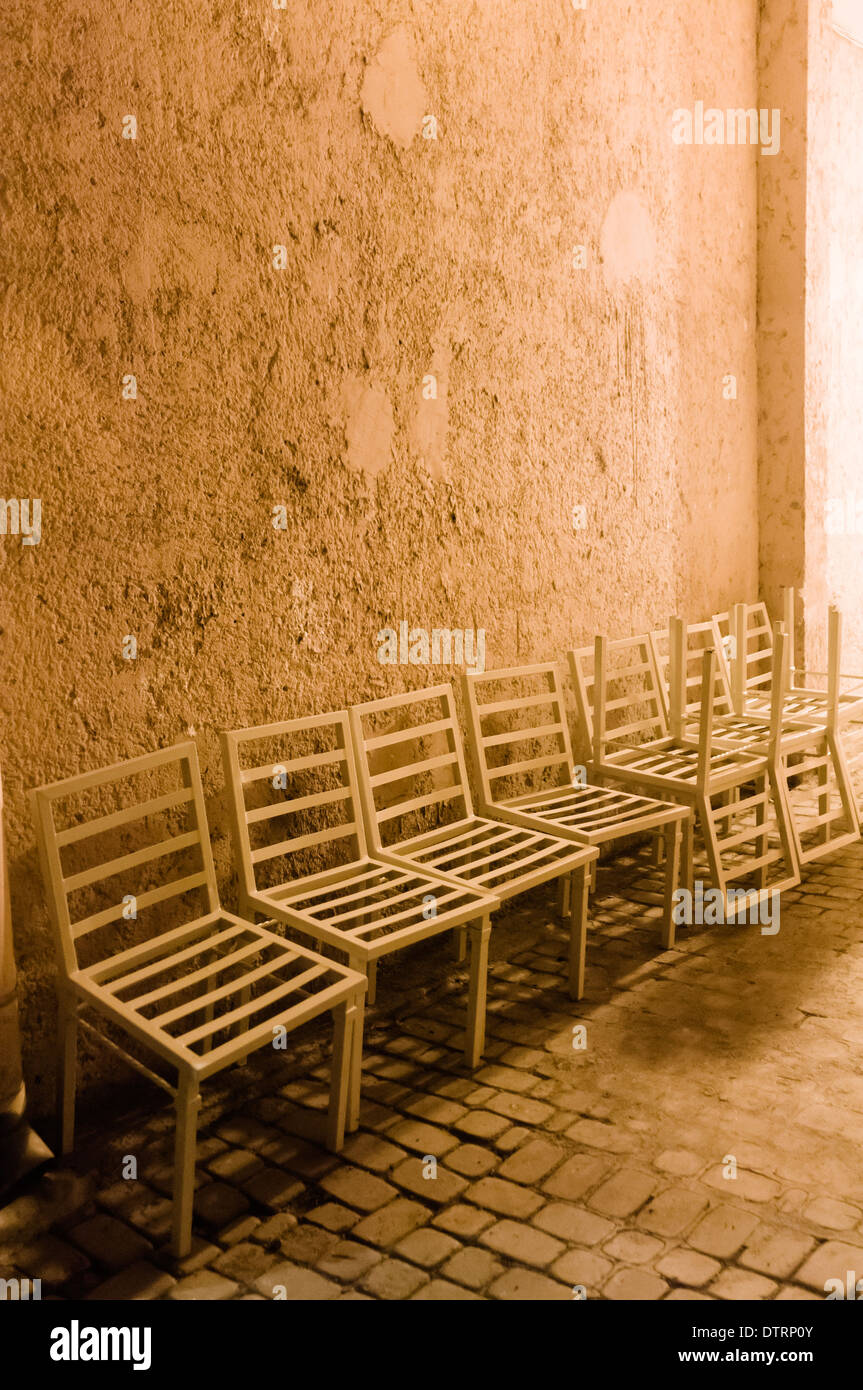 Chairs lined up in a corridor. Stock Photo
