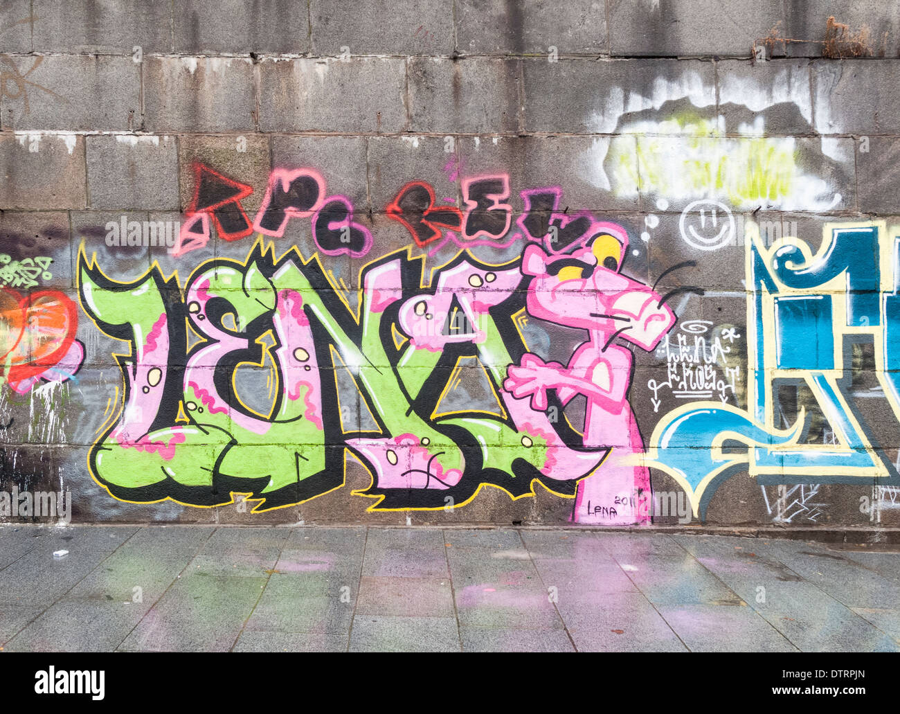 Colourful grafitti including the Pink Panther, spelling 'Lena', in Kiev, Ukraine Stock Photo