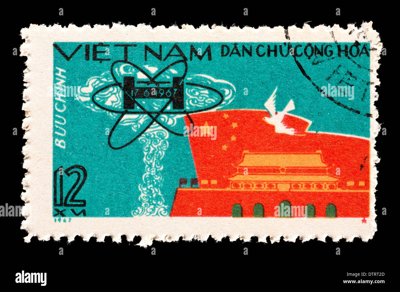 Postage stamp from North Vietnam depicting the first Chinese hydrogen bomb test. Stock Photo