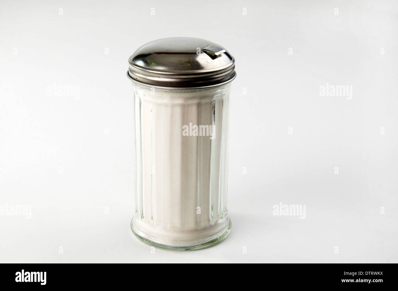 Classic sugar container filled with sugar. Stock Photo