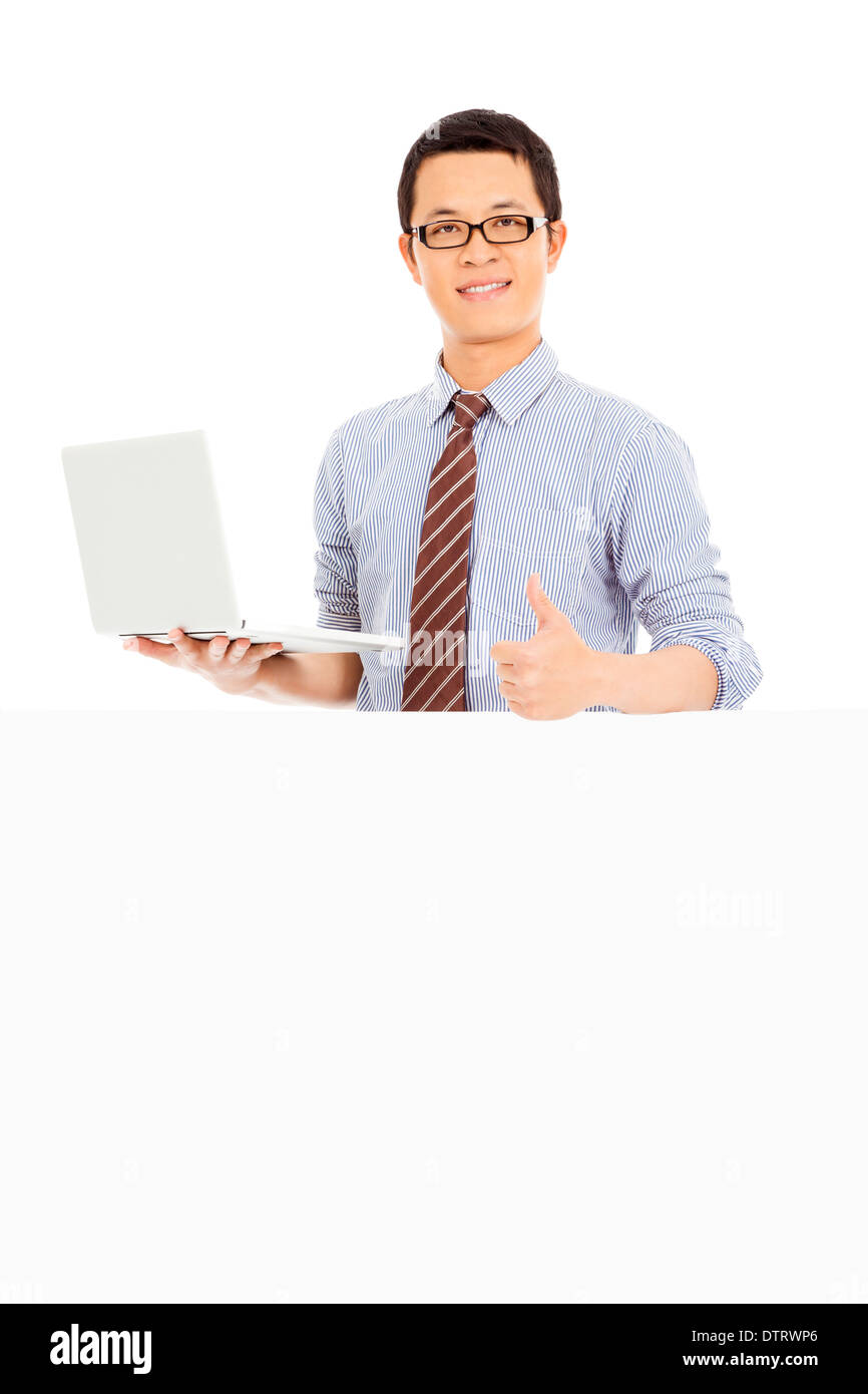 happy computer engineer thumb up with white board in studio Stock Photo