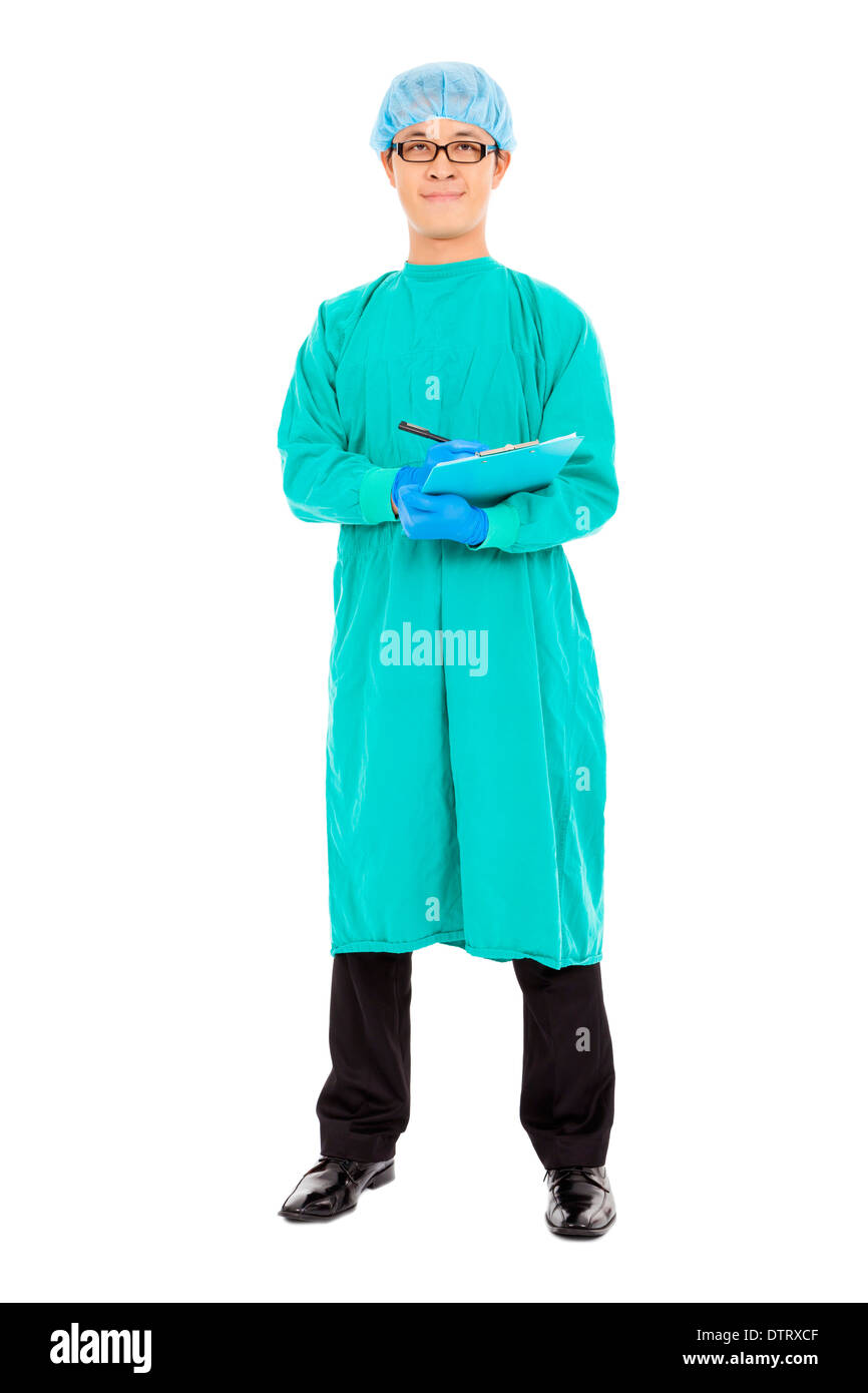 portrait of surgeon or checker in mask and standing in studio Stock Photo