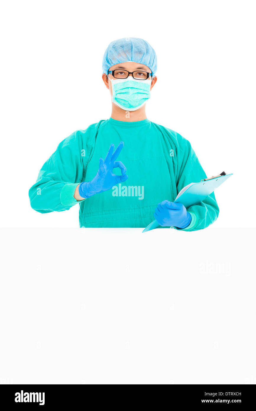 surgeon or checker thumb up with  white board in studio Stock Photo